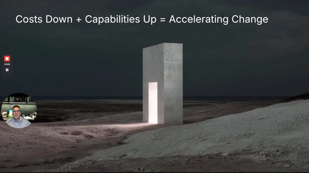 Slide "Costs Down + Capabilities Up = Accelerating Change" (15:00). "Hold on to your hats."